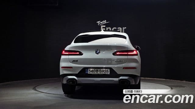 BMW X4 2022 — ფოტო 4/20
