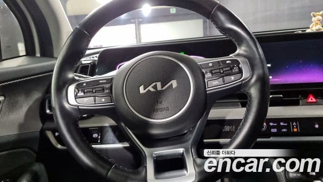 Kia Sportage 2021 — ფოტო 13/18