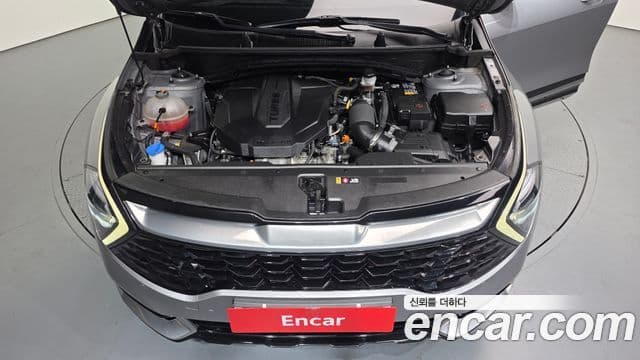 Kia Sportage 2021 — ფოტო 6/20