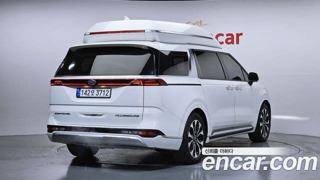 Kia Carnival 2021 — ფოტო 1/20