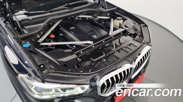 BMW X5 2022 — ფოტო 6/20