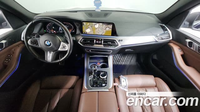 BMW X5 2022 — ფოტო 7/20