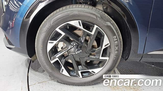 Kia Sportage 2021 — ფოტო 5/20