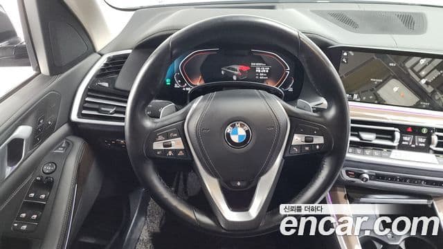 BMW X5 2021 — ფოტო 13/20