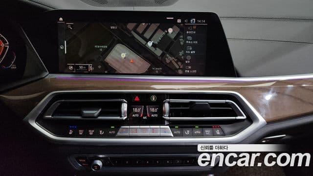 BMW X5 2021 — ფოტო 14/20