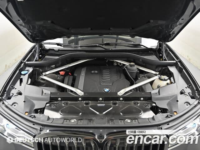 BMW X7 2022 — ფოტო 15/20