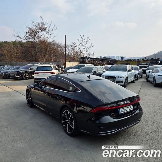 Audi A7 2021 — ფოტო 6/18