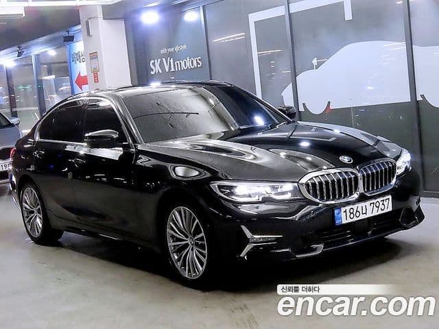 BMW 3 Series 2022 — ფოტო 1/20