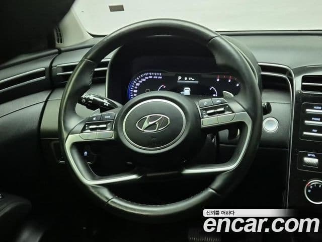 Hyundai Tucson Hybrid 2021 — ფოტო 6/19