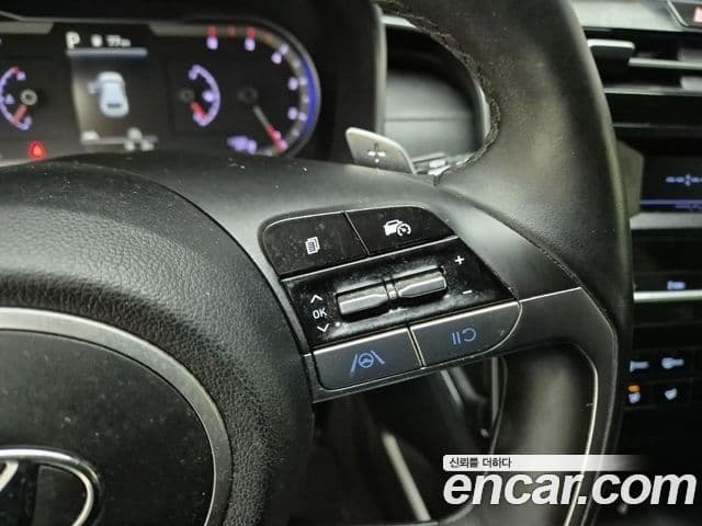 Hyundai Tucson Hybrid 2021 — ფოტო 18/19