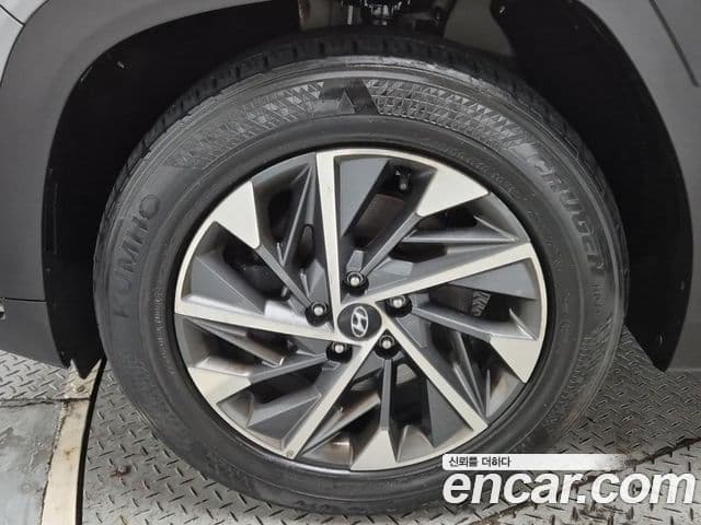 Hyundai Tucson Hybrid 2021 — ფოტო 16/19