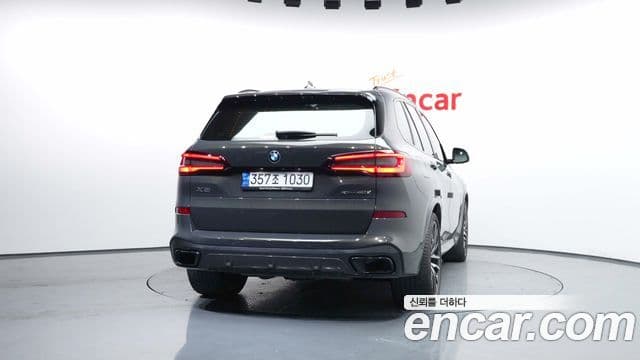BMW X5 2022 — ფოტო 4/20