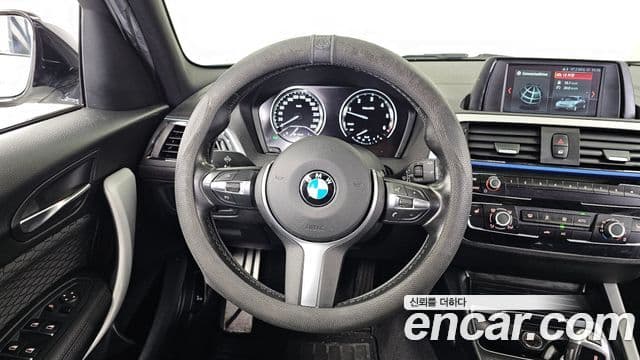 BMW 1 Series 2018 — Şəkil 12/20