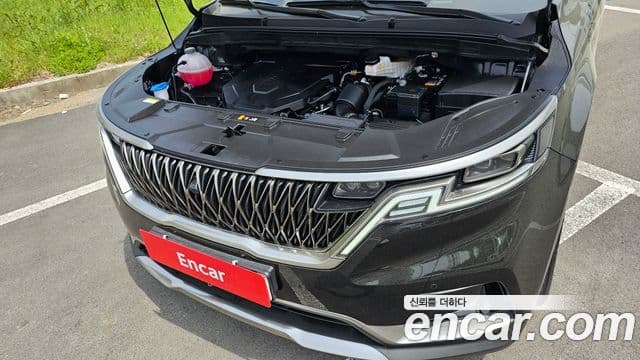 Kia Carnival 2023 — ფოტო 6/20