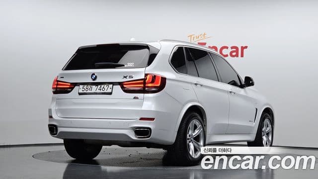 BMW X5 2018 — ფოტო 1/20