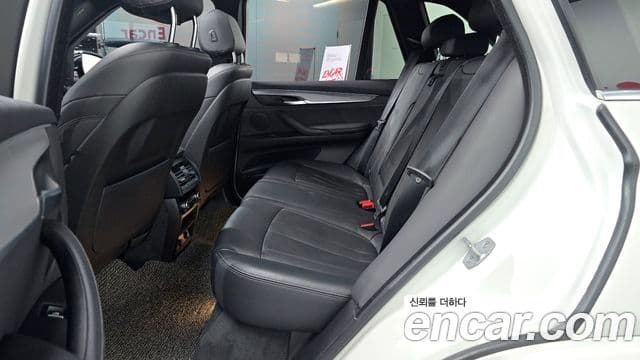 BMW X5 2018 — ფოტო 11/20
