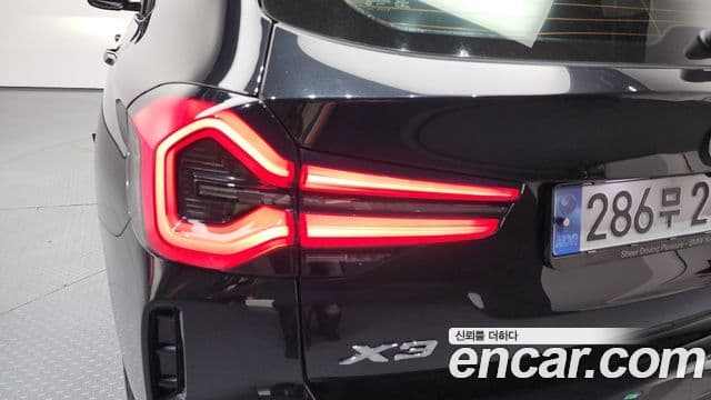 BMW X3 2022 — ფოტო 22/32