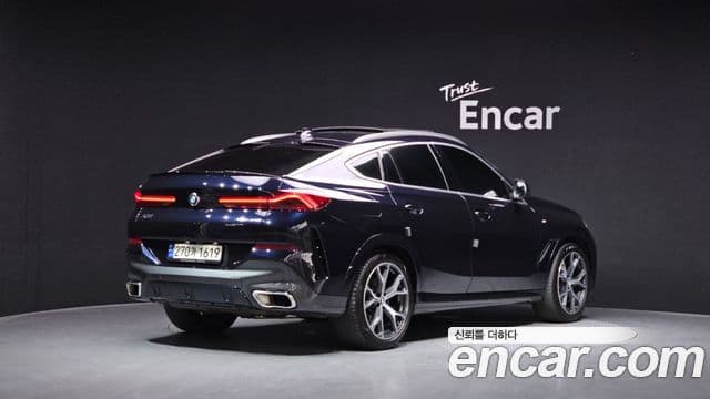 BMW X6 2023 — Фото 2/20