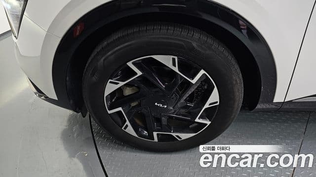 Kia Sportage 2021 — ფოტო 5/20