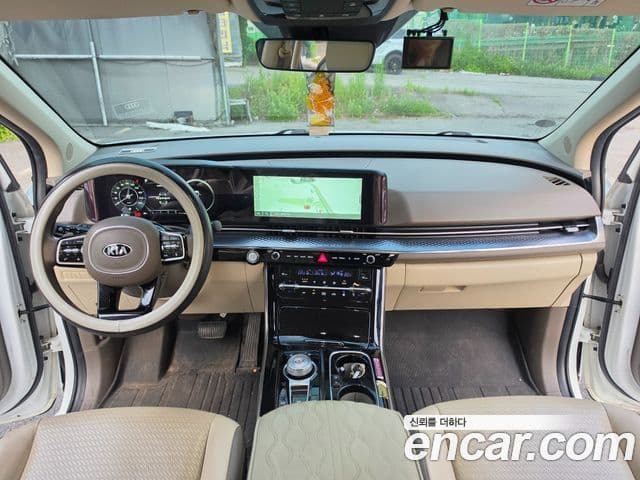 Kia Carnival 2021 — ფოტო 7/20