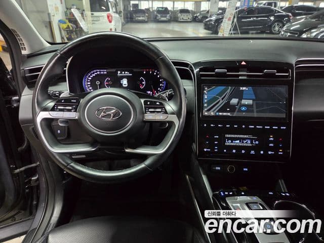 Hyundai Tucson Hybrid 2022 — ფოტო 8/20