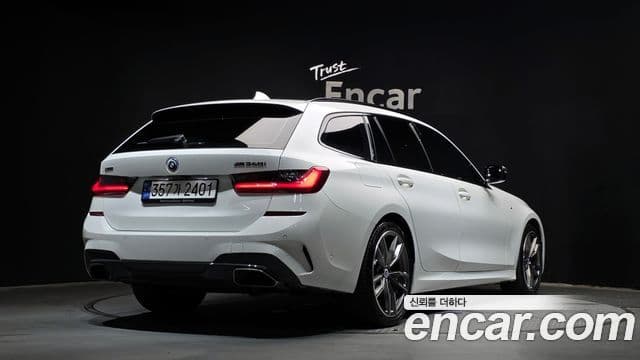 BMW 3 Series 2022 — ფოტო 1/20