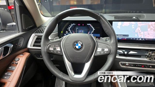BMW X5 2024 — ფოტო 13/20