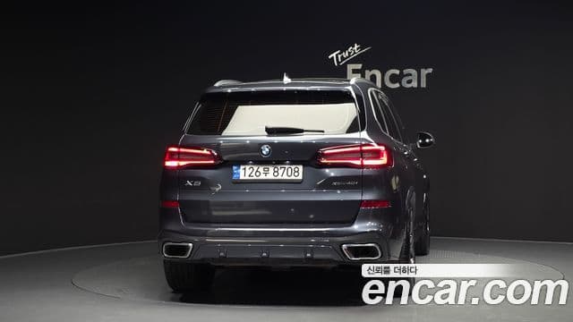 BMW X5 2022 — ფოტო 4/20