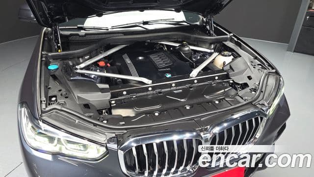 BMW X5 2022 — ფოტო 6/20