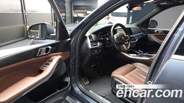 BMW X5 2022 — ფოტო 10/20