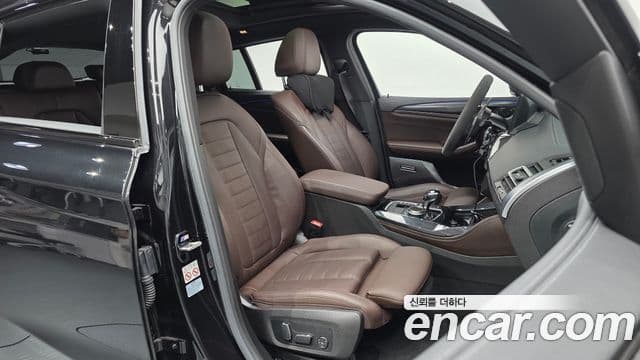 BMW X4 2023 — Фото 12/20