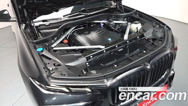 BMW X7 2023 — ფოტო 6/20
