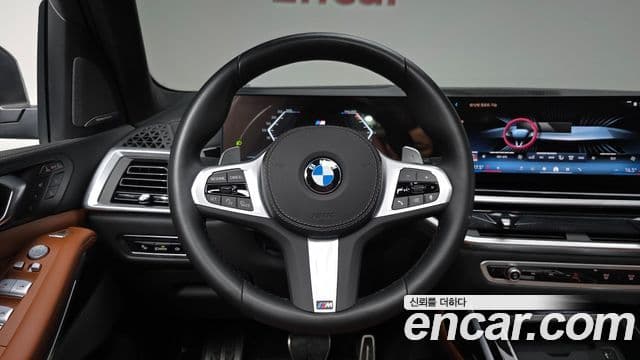 BMW X7 2023 — ფოტო 13/20