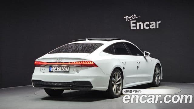 Audi A7 2020 — ფოტო 2/20