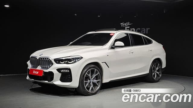 BMW X6 2021 — Фото 1/20