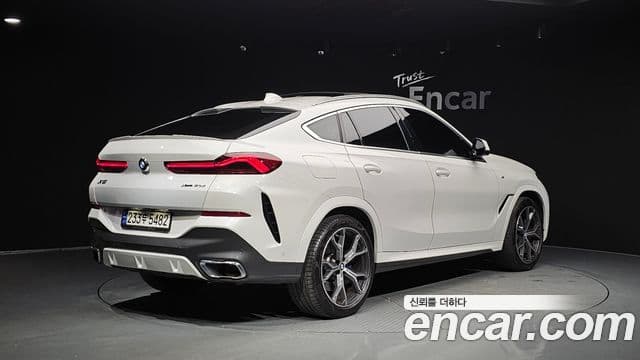 BMW X6 2021 — Фото 2/20