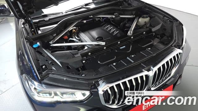 BMW X5 2023 — ფოტო 6/20