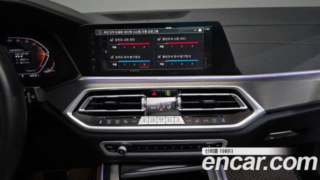 BMW X5 2023 — ფოტო 13/20