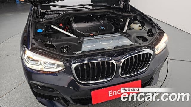 BMW X3 2021 — ფოტო 6/20