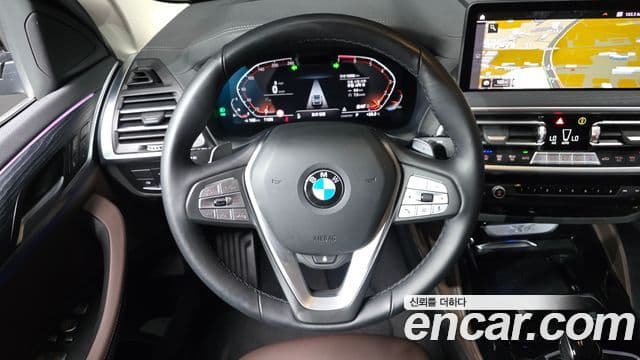 BMW X4 2025 — ფოტო 14/20