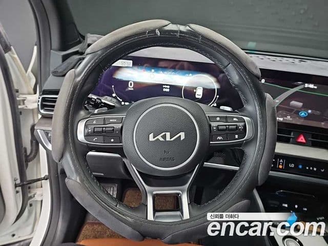 Kia Sportage 2021 — ფოტო 7/19