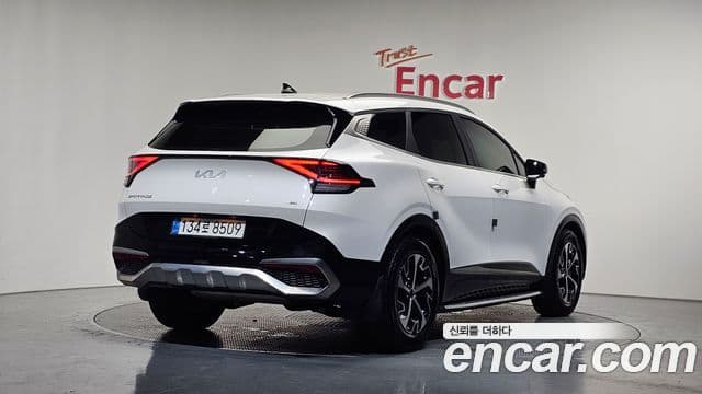 Kia Sportage 2023 — Фото 1/20
