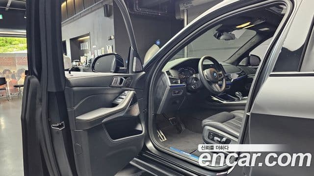 BMW X7 2021 — ფოტო 10/20