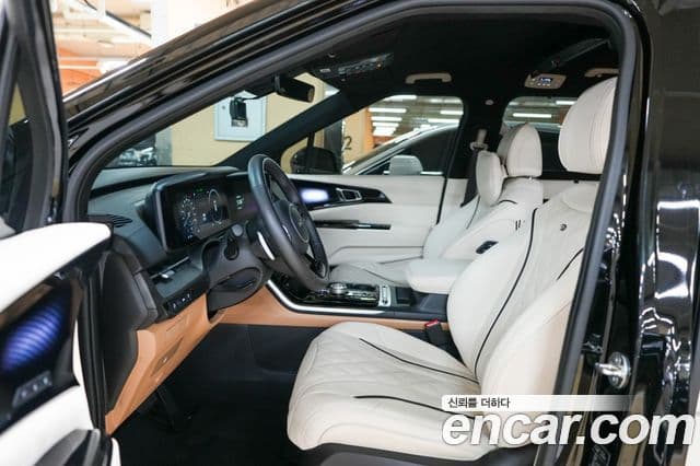 Kia Carnival 2023 — ფოტო 14/20