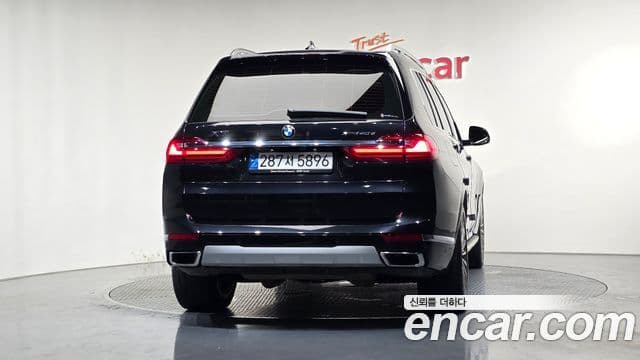BMW X7 2022 — ფოტო 4/20