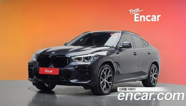 BMW X6 2022 — Фото 1/20