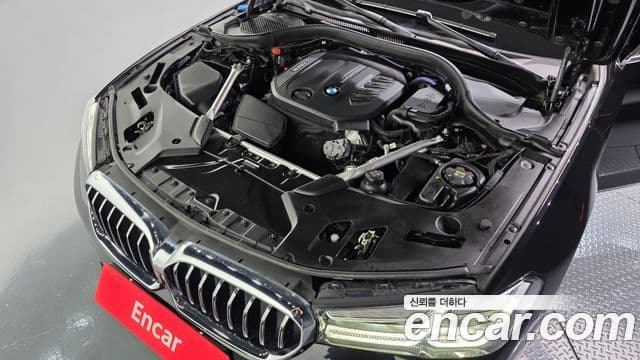 BMW 5 Series 2023 — ფოტო 6/20