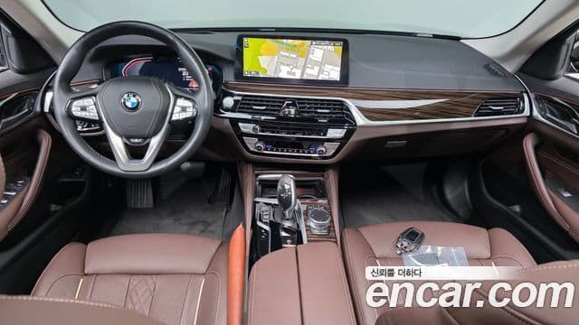 BMW 5 Series 2023 — ფოტო 7/20