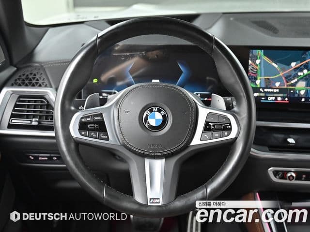 BMW X5 2023 — ფოტო 13/20
