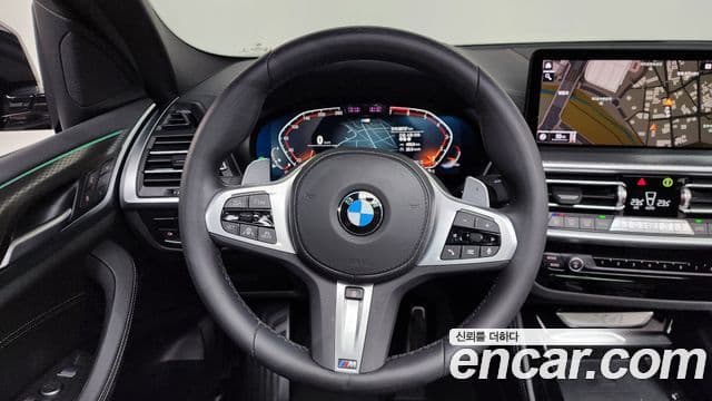 BMW X4 2024 — Фото 12/20